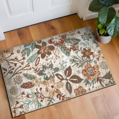 Tapis beige à motif floral multicolore