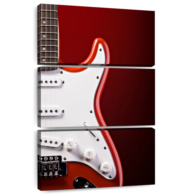 Modern Electric Guitar On Red