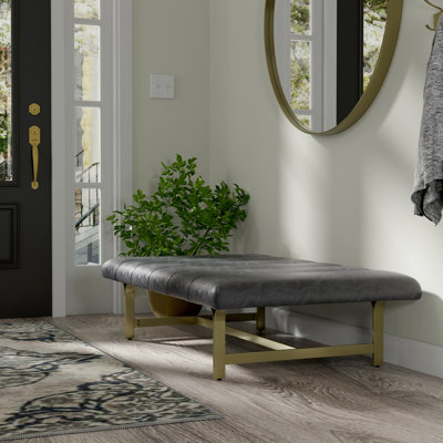 Table basse rembourrée en cuir végétalien avec base en métal Lorinda