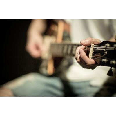 Play The Guitar - Wrapped Canvas Print