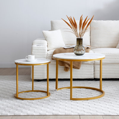 HomeRoots Set Of Two 35 Inch Gold Round Nesting Coffee Tables - Glass Top With Steel Base, Modern Living Room