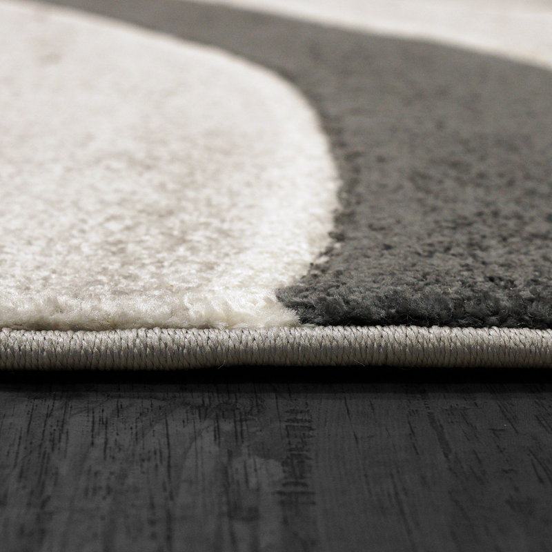 Tapis géométrique en polypropylène gris anthracite / ivoire / gris Kiyondrea, Rectangle 7 pi 10 po x 10 pi 6 po