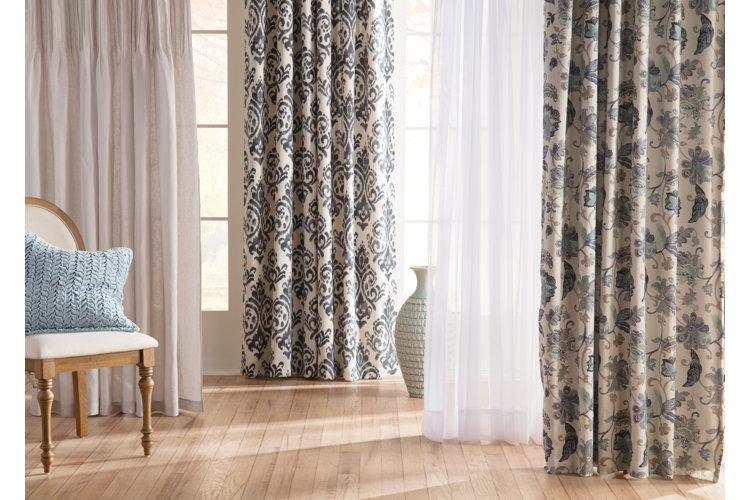 layers of sheer and blackout curtains