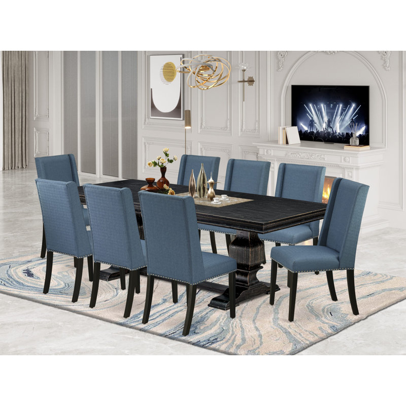 Cet ensemble de table à manger 9 pièces comprend une table de salle à manger et 8 chaises de cuisine en tissu de lin bleu minéral avec dossier rembourré - finition noire sablée.