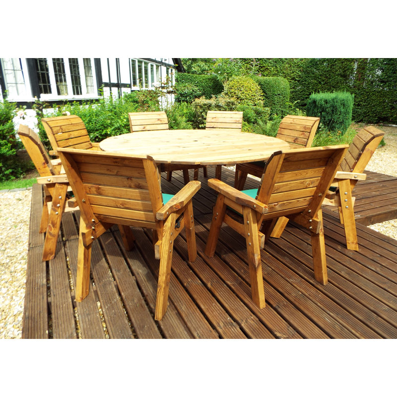 Farris 8 - Person Wood Patio Dining Set with Round Table , Cushions Included, Green