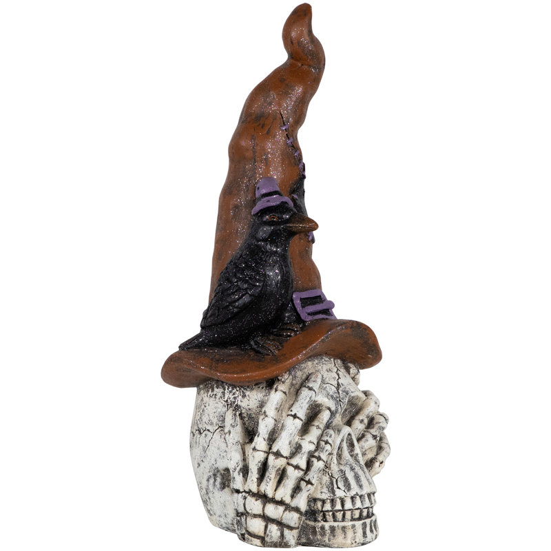 Crâne avec chapeau de sorcière et décoration d'Halloween