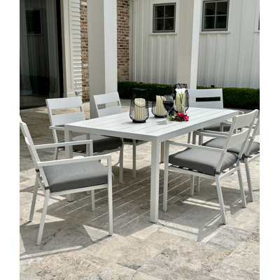 Zella 6 - Person Metal Patio Dining Set with Rectangular Table , Cushions Included