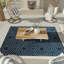 Tapis géométrique bleu en polypropylène tissé à la machine Kamarre-87941100