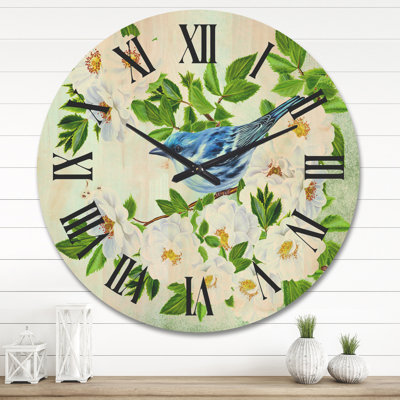 Horloge murale petit oiseau assis sur une branche de bois de rose
