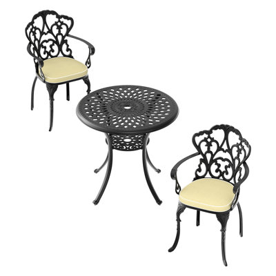 Table et chaises de patio en fonte d'aluminium avec coussins décoratifs - noir