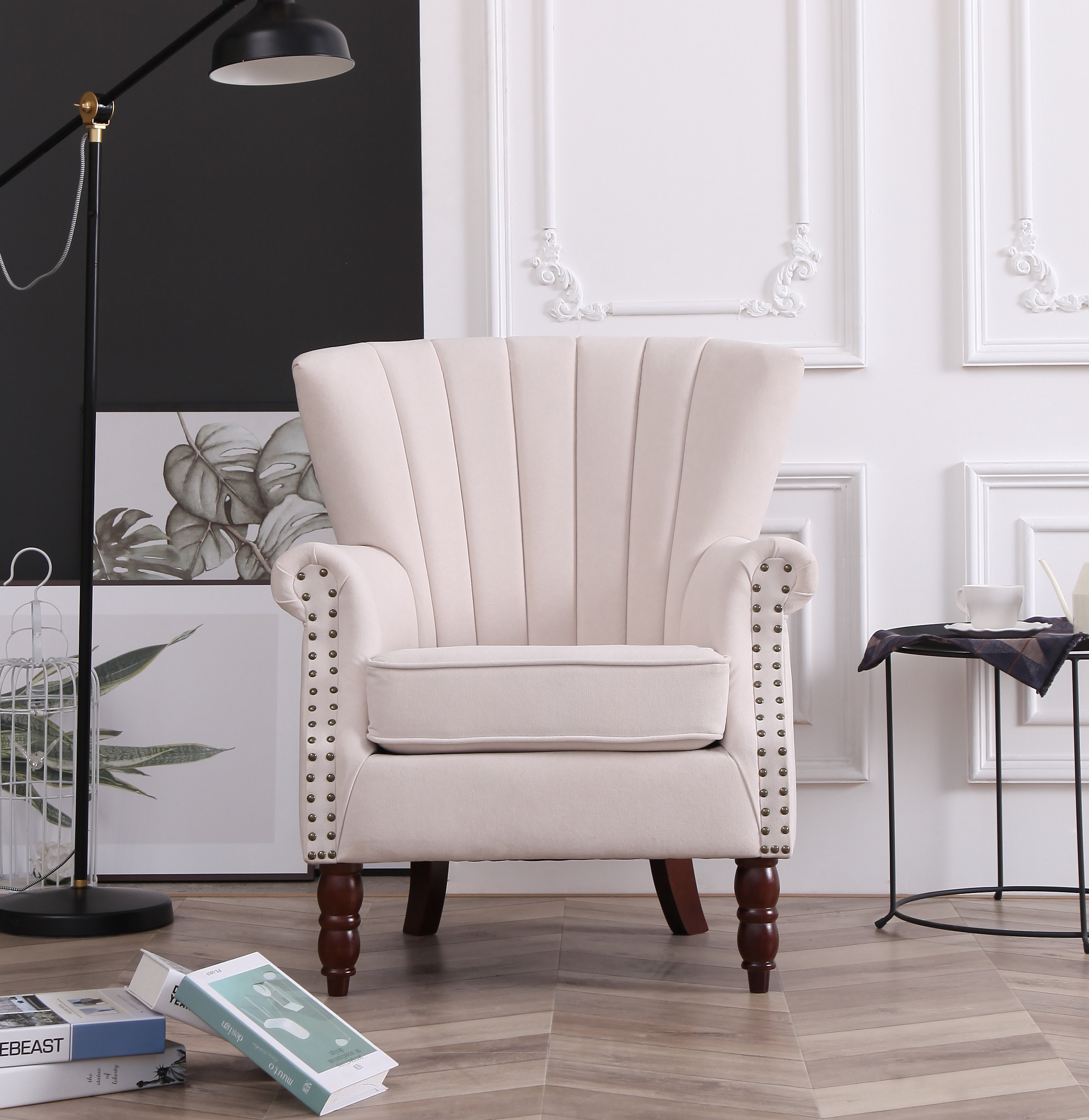 https://assets.wfcdn.com/im/53541318/compr-r85/1271/127157810/antwanae-upholstered-wingback-chair.jpg