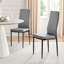 Lenworth Black Metal and Glass Rectangular Dining Table Set with 6 Quilted Faux Leather Chairs-70488807