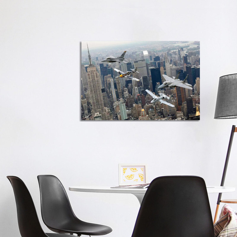 A P-51 Mustang, F-16 Fighting Falcon, F-15 Eagle, and A-10 Thunderbolt II Fly over New York City 1 Piece Wrapped Canvas Wall Art