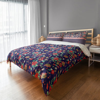 Taie décorative bleu marine à fleurs