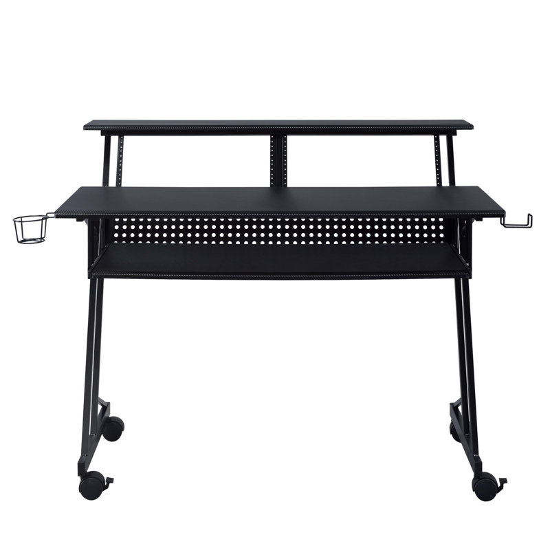 Bureau de studio noir avec plateau pour clavier