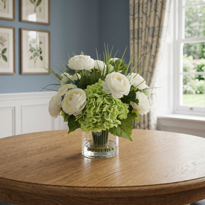 Ranuculus, Hydrangea and Grass Arranged in a Glass Vase