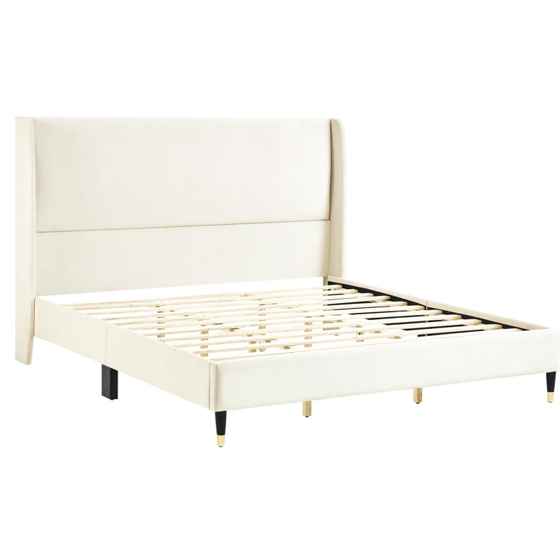 Le lit confortable en velours beige très grand - la plateforme à oreilles pour une chambre à coucher de style ajoute une touche d'élégance à