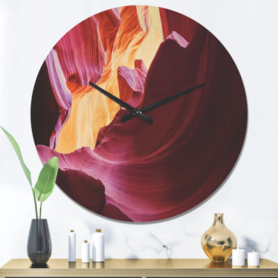 Horloge murale mauve en bois d'antilope