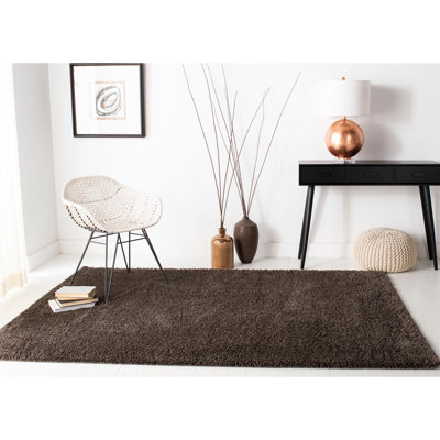 Jiang Brown Area Rug