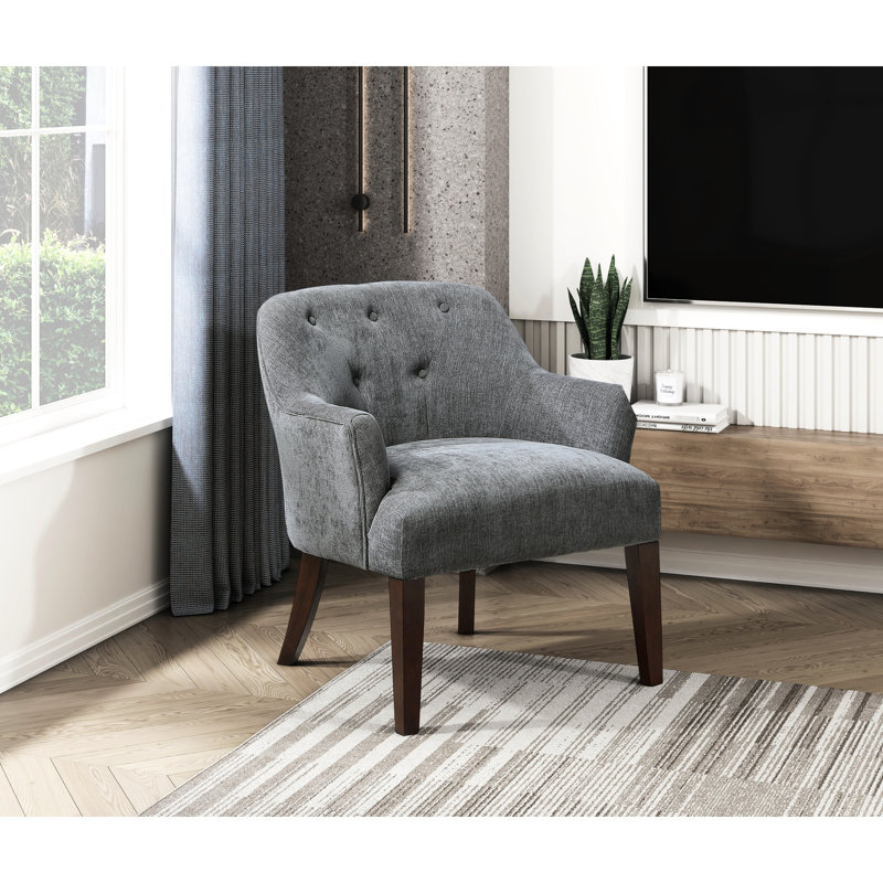 Fauteuil à dossier gris, siège en mousse et pieds en bois massif