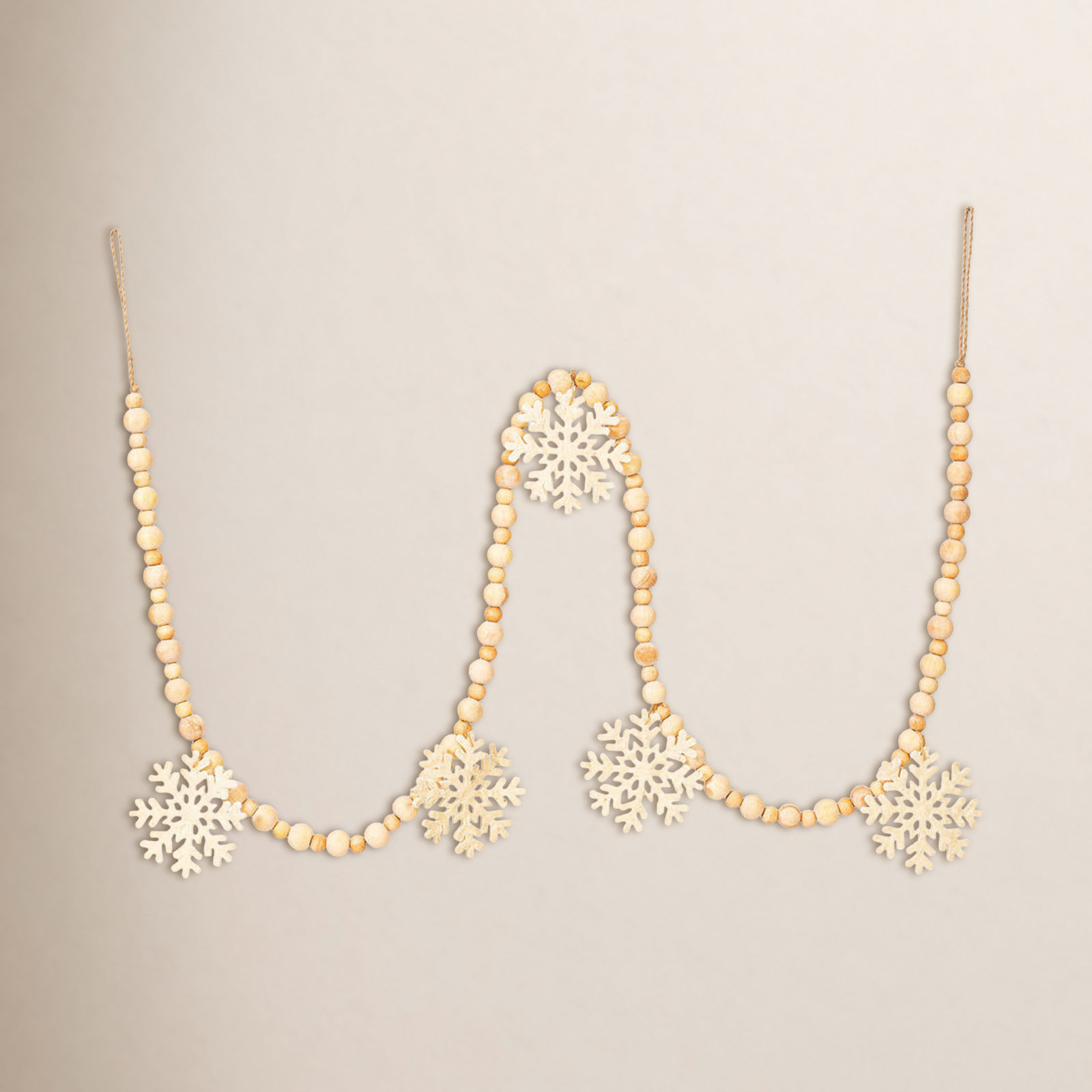 Ophelia & Co. 5' Ivory Felt Snowflake and Natural Wood Bead Garland.