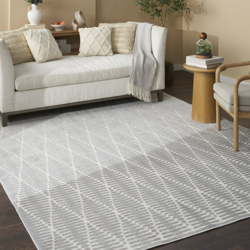 Tapis intérieur gris clair Nourison Care Free, Rectangle 7 pi 10 po x 9 pi 10 po