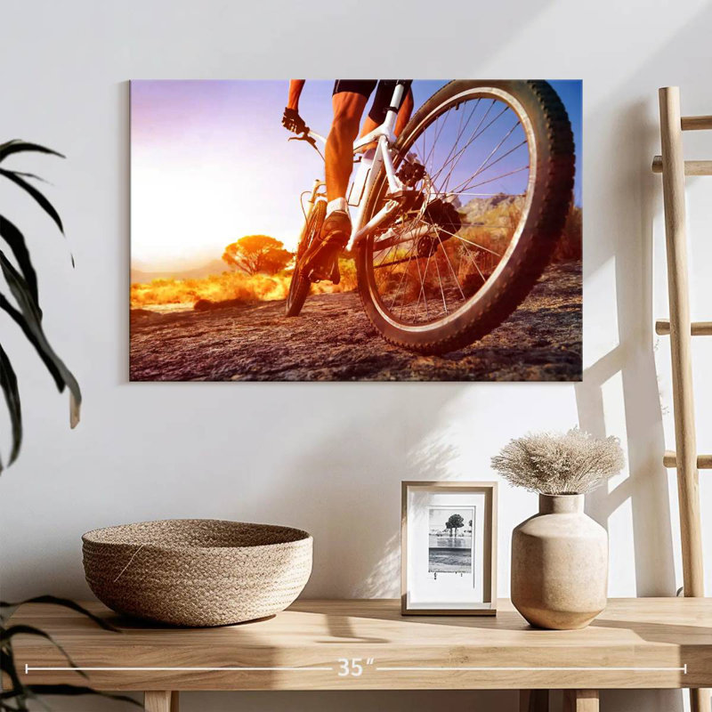 Sireci à vélo au coucher du soleil, H 16 po x l 24 po