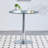 The modern and simple round glass dining table is equipped with silver-plated legs and is suitable for various scenarios