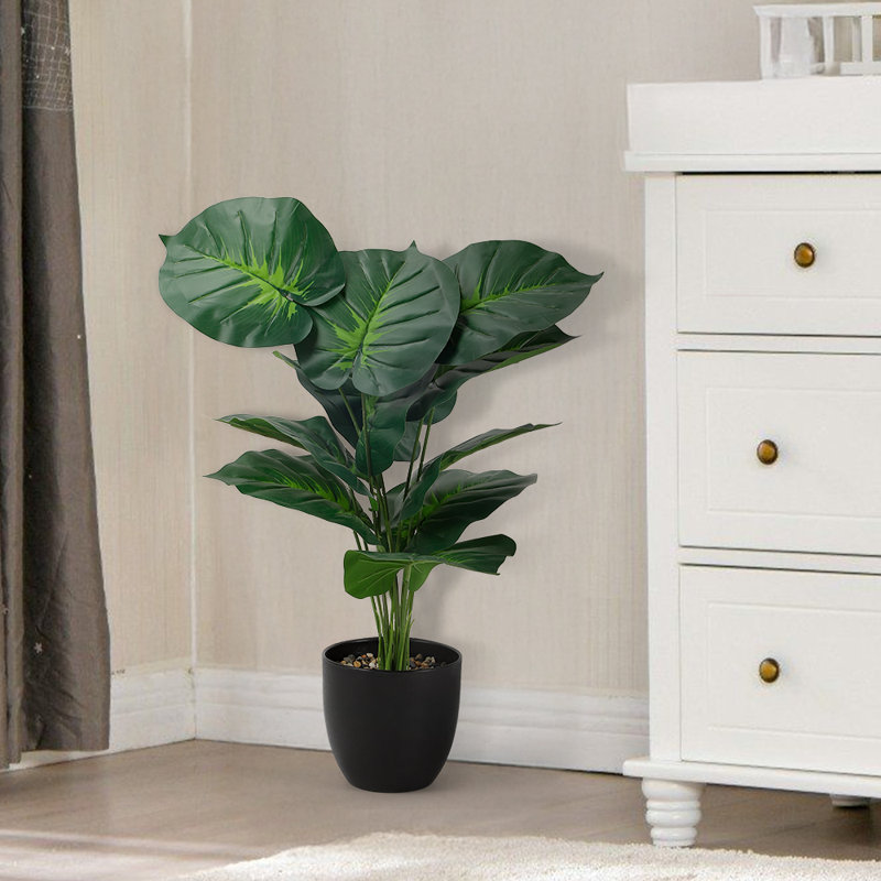 Grande plante artificielle verte en pot