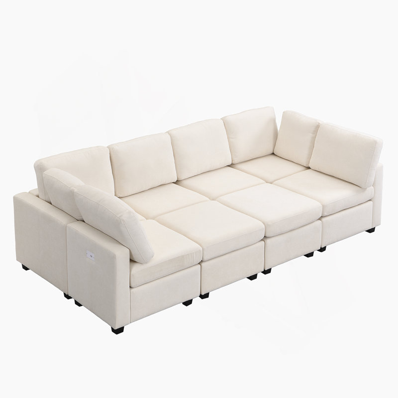 Canapé beige en chenille à accoudoirs carrés