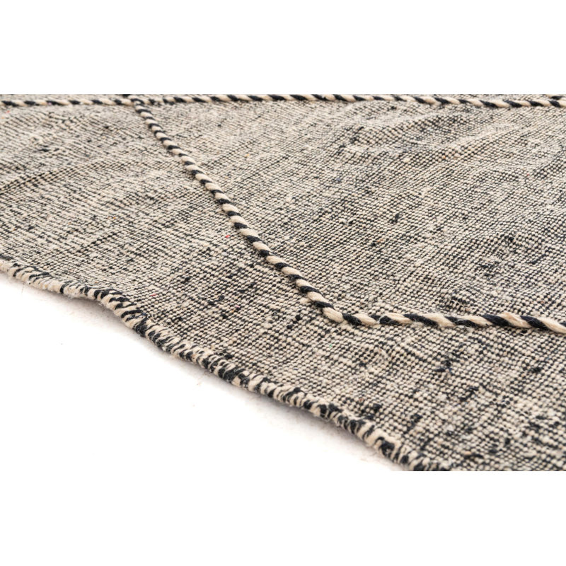 Tapis noir et blanc Orpheus