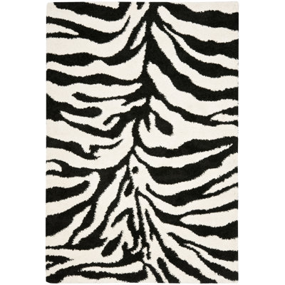 Braylee Animal Print Area Rug