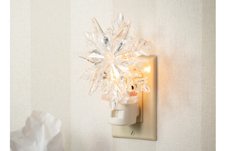 closeup of a snowflake shaped night light