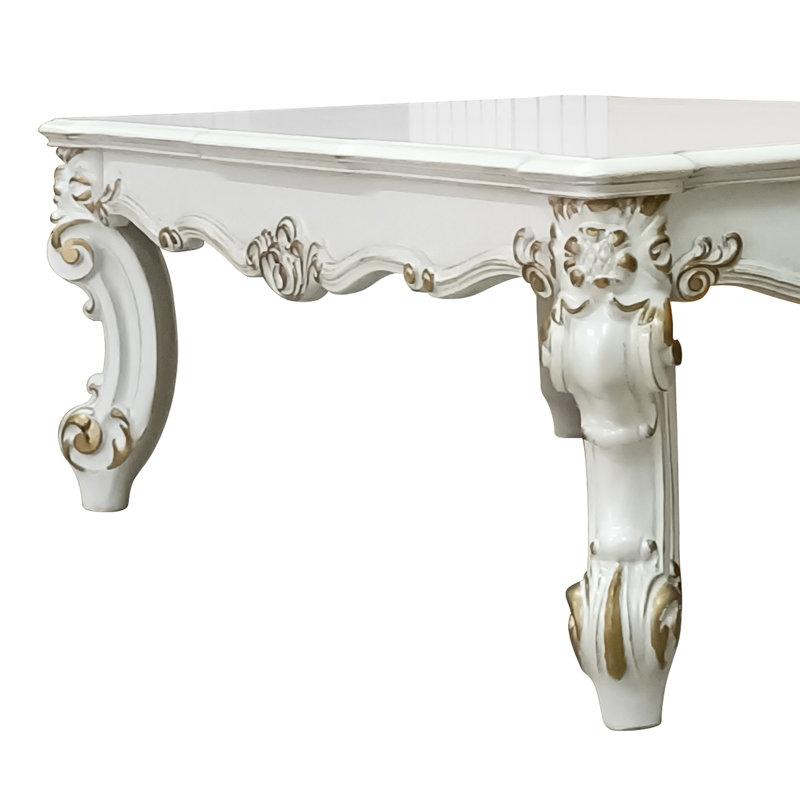 Table basse perle antique avec pieds à volutes complexes - Améliore l'espace de travail