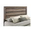 Ensemble de chambre à coucher 3 pièces Brennan couleur taupe délavé, comprenant un lit à panneaux et des tables de chevet.