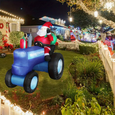Père Noël gonflable de 1 pi 5,41 pi et tracteur - Décoration de fête extérieure / intérieure avec lumières, sac-cadeau et capuchons moelleux - parfait pour les fêtes de Noël, les réunions de famille et les célébrations de jardin