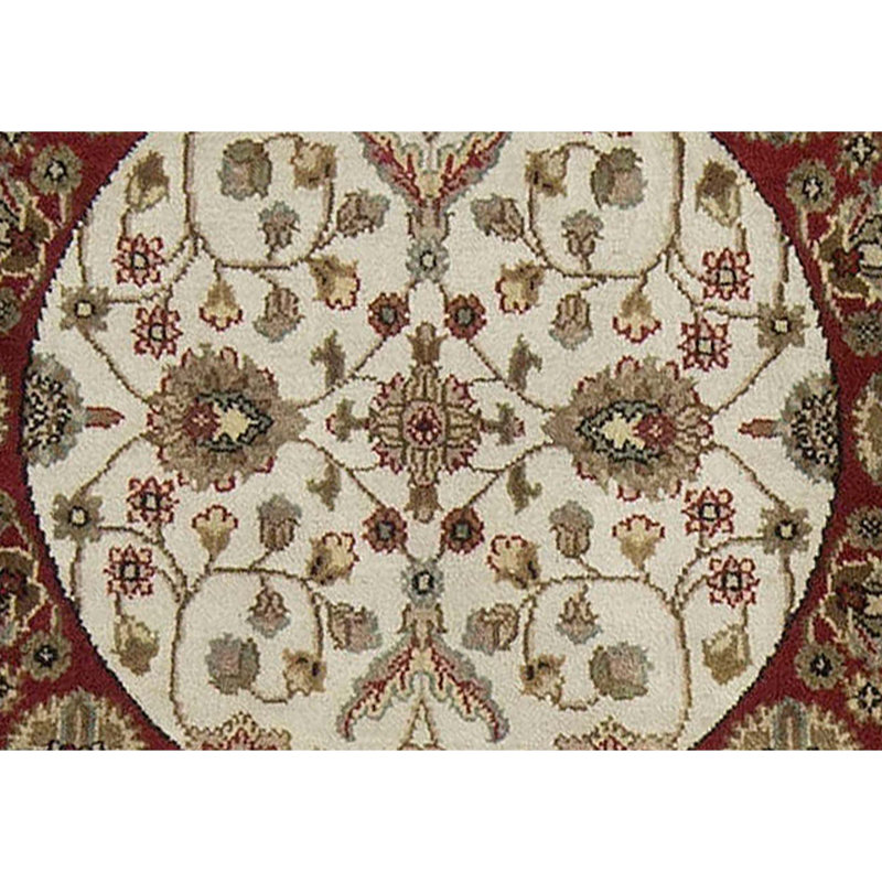 Tapis rose et ivoire de haute qualité noué à la main