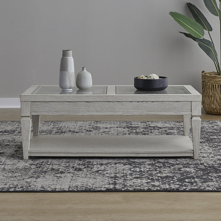 Rechetta Cocktail Table w/ Casters