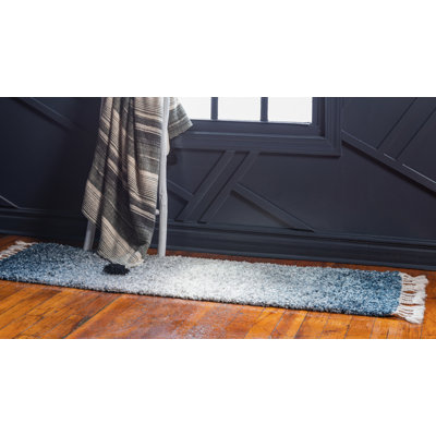 Tapis bleu à rayures Mitzy