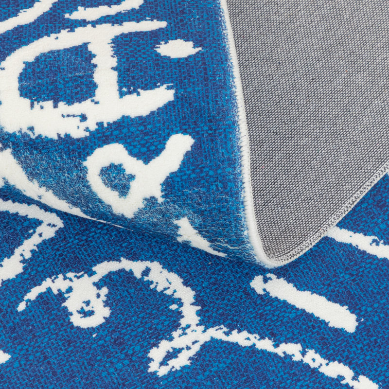 Tapis bleu en polyester tissé à la machine Sportsglyphs, Rectangle 7 pi 9 po x 9 pi 9 po