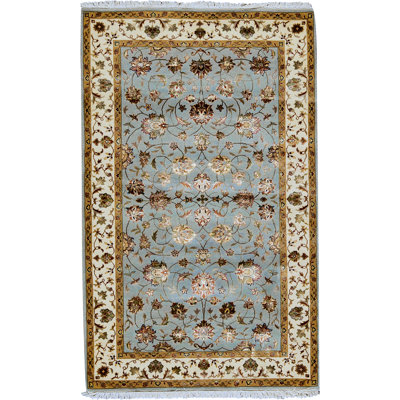 Tapis bleu clair et ivoire noué à la main de haute qualité