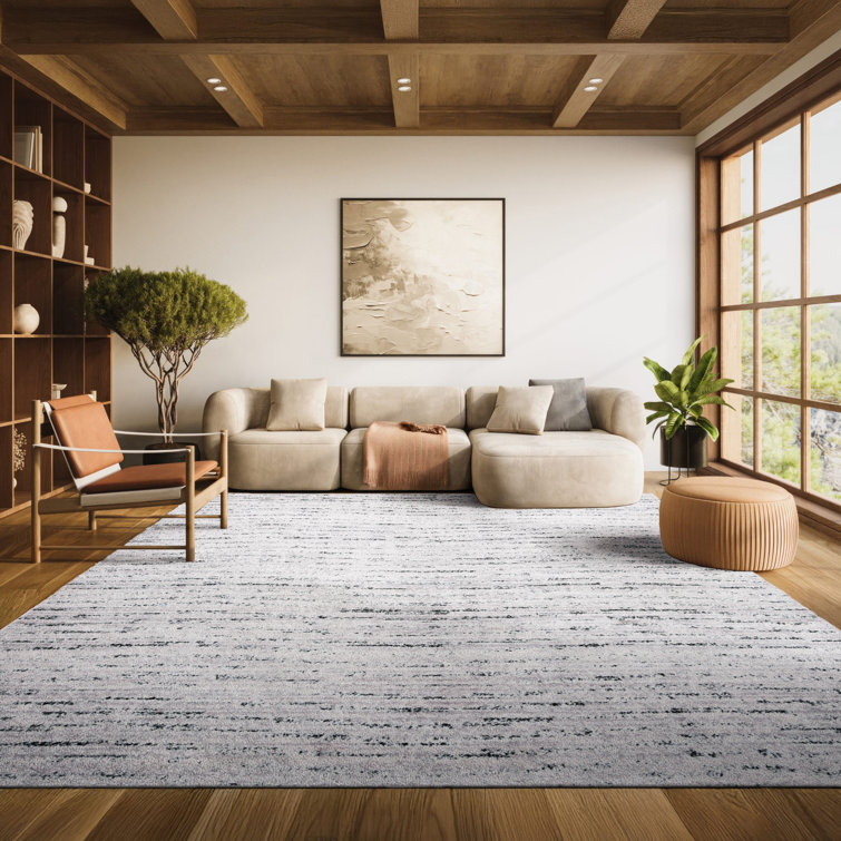 Riebe Abstract Ivory/Silver Area Rug
