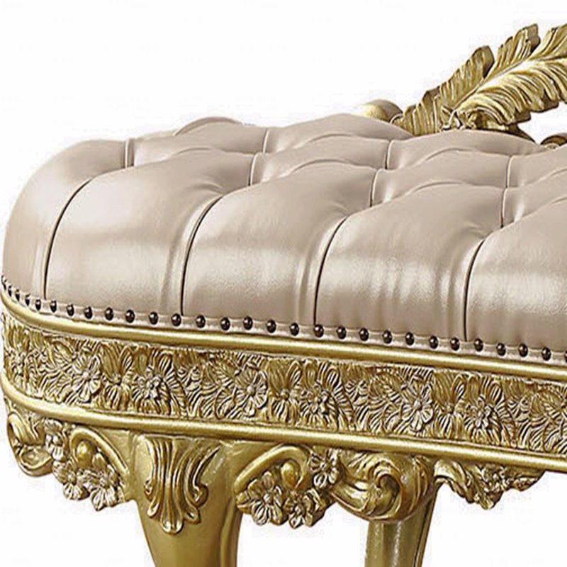 Banc en cuir synthétique et finition dorée