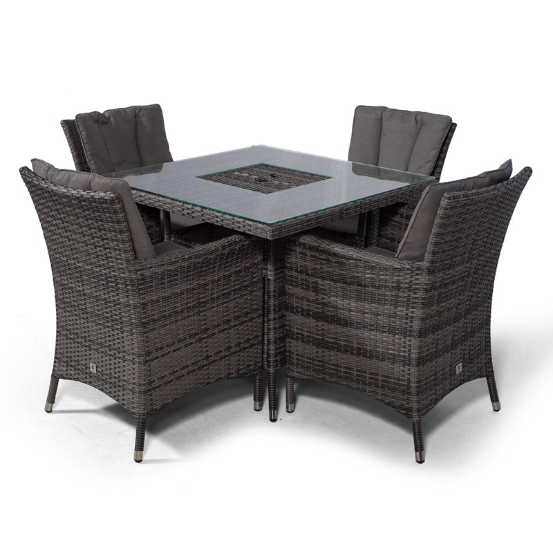 Karcher 4 - Person Wicker Patio Dining Set with Square Table , Cushions Included, Grey