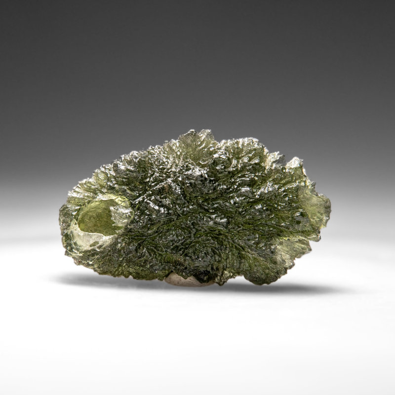 Genuine Moldavite Tektite (18.8 grams), 0.5" H x 1" W x 1.75" D