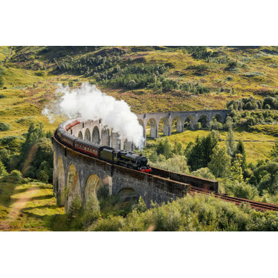 Steam Train On Glenfinnan Viaduct by Lukas Bischoff - Wrapped Canvas Photograph