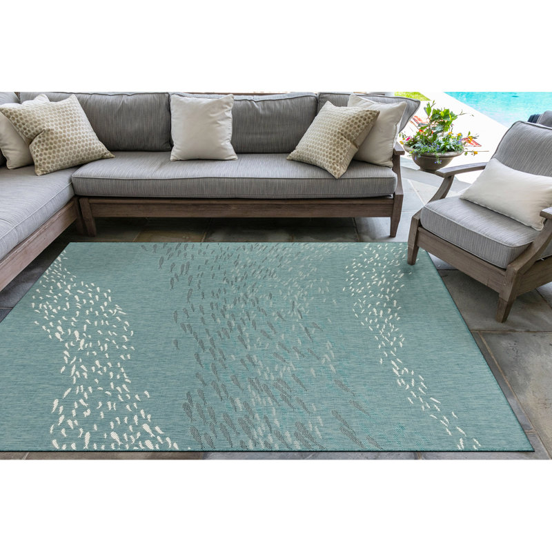 Tapis bleu turquoise tissé à la machine