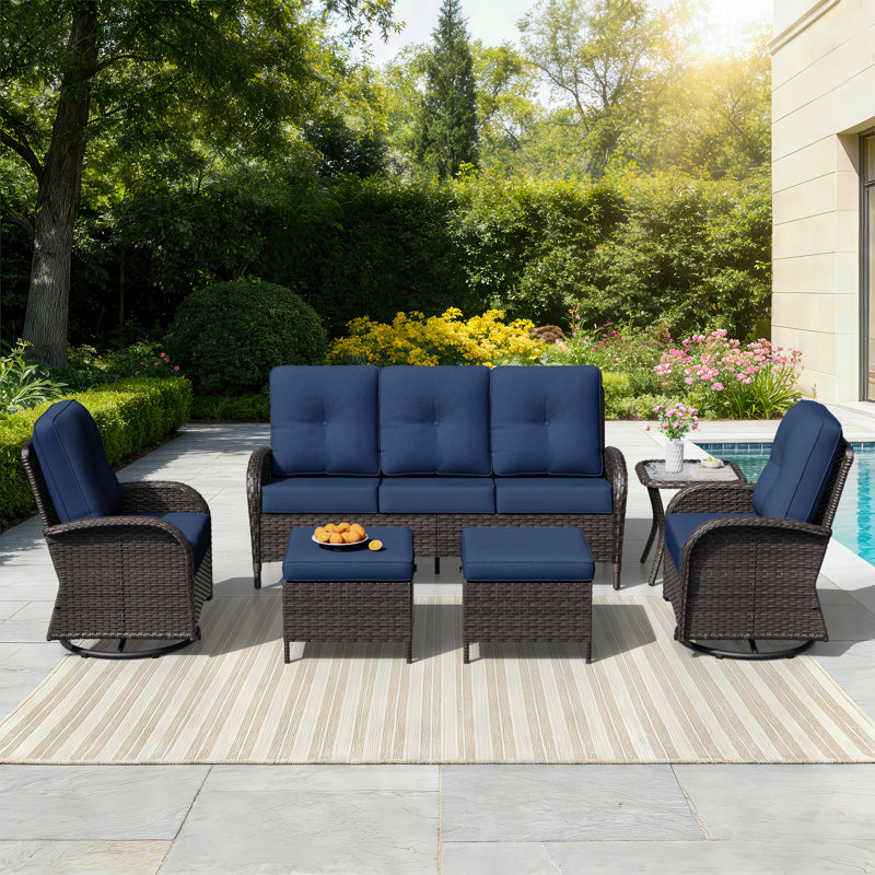 Ensemble de conversation avec canapé en rotin pour 5 personnes avec table d'appoint, 2 chaises pivotantes, 2 repose-pieds et coussins bleus