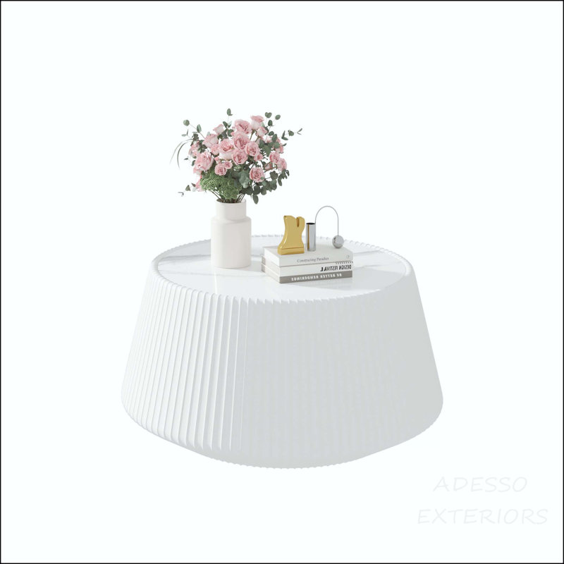 Table basse ronde avec plateau en pierre frittée et base en microfibre