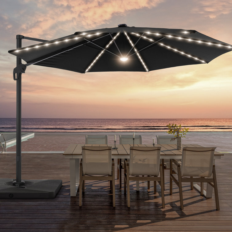 Haslingden 11' Lighted Cantilever Umbrella with Crank Lift Counter Weights Included